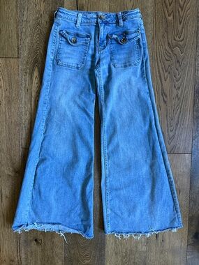 Free People Light Blue High-Rise Flare Jeans with Front Flap Pockets, Vintage